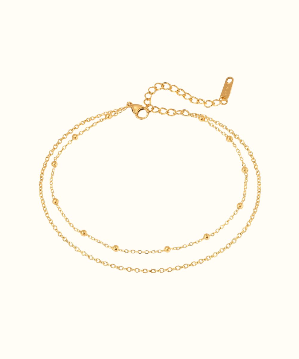 Cavigliera donna modello Dual in acciaio inossidabile con design a due fili elegante e resistente - Suntime Moda