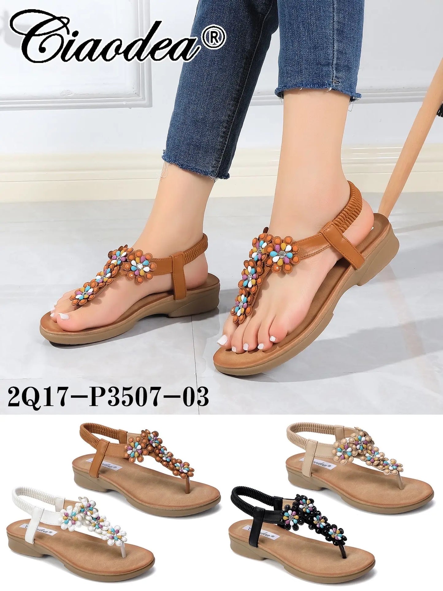 Dettaglio di sandali infradito con decorazioni floreali e cinturino elastico posteriore - SUNTIMEMODA