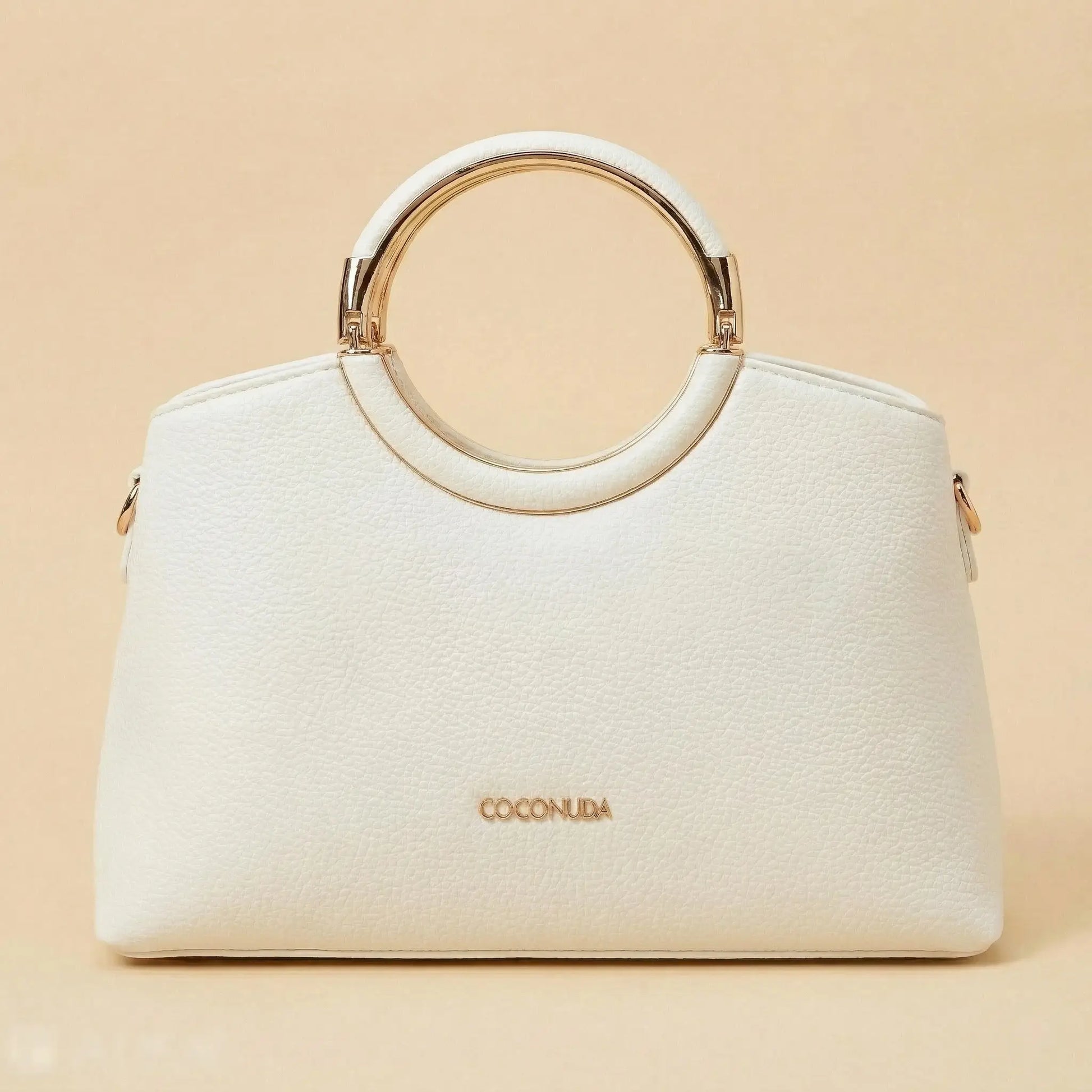 Dettaglio interno capiente borsa COCONUDA bianca con scomparti e fodera beige - SUNTIMEMODA