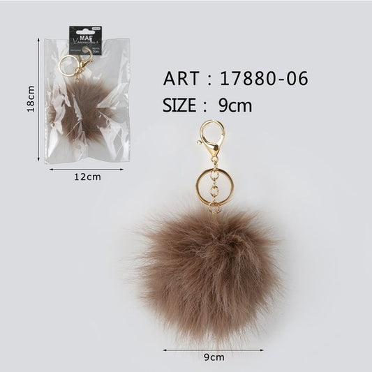 Ciondolo pom pom marrone da 9 cm con anello portachiavi dorato. - SUNTIMEMODA